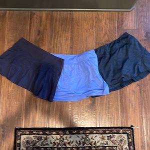 Bundle Lija tennis skirts navy small and medium. Baby blue medium